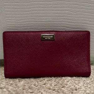 Burgundy Kate Spade wallet no rips or pen marks